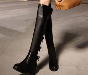 knee high boots with bow on back
